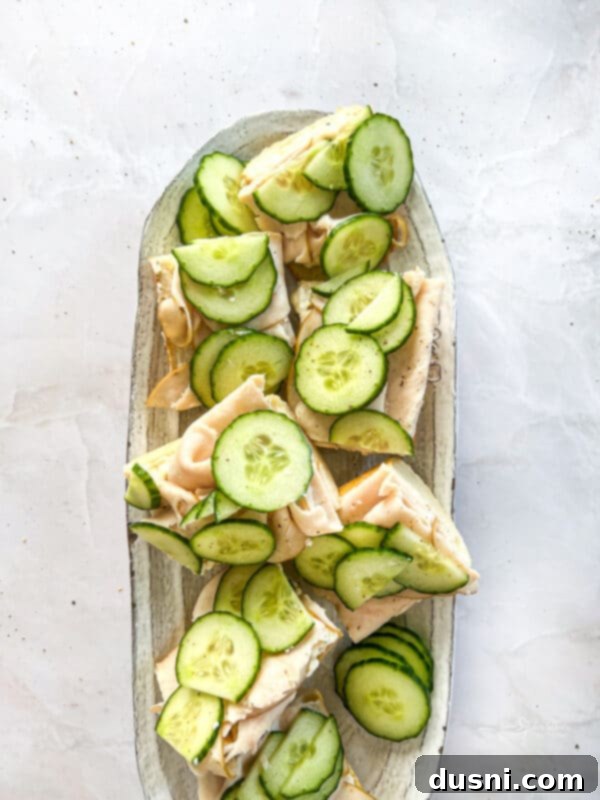 Close-up of perfectly cut Turkey Ranch Baguette sandwiches