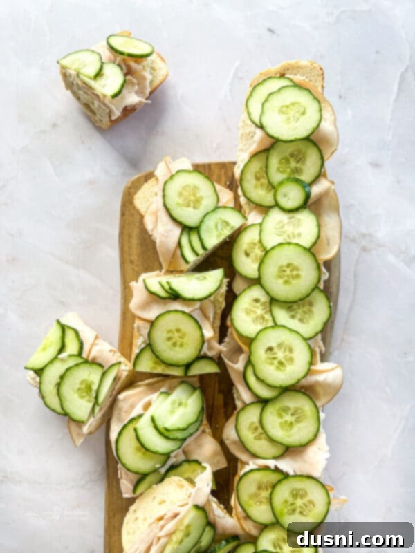 Assortment of delicious Turkey Ranch Baguette sandwiches on a platter