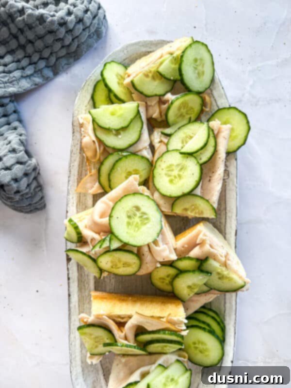 A tray of beautifully arranged Turkey Ranch Baguettes, perfect for a gathering