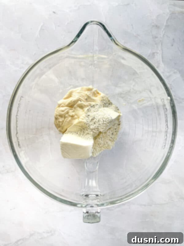 Step 1: Mixing mayonnaise, cream cheese, and ranch seasoning for the spread