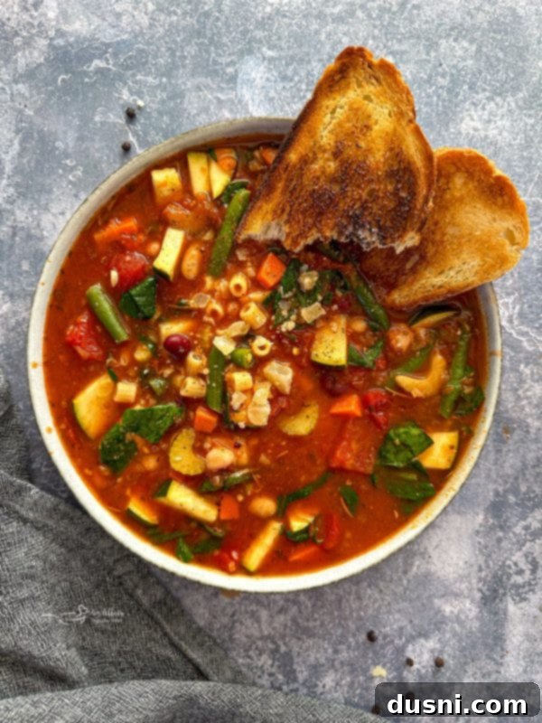 Simmered Garden Minestrone 12 Another angle of the minestrone soup in a bowl.