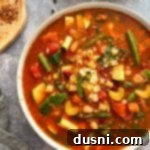 Simmered Garden Minestrone 17 Extreme close up of all the veggies in the crockpot Minestrone soup.