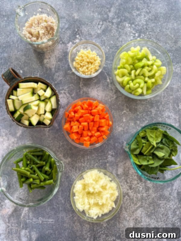 Simmered Garden Minestrone 7 Overhead view of minestrone soup ingredients laid out before cooking.