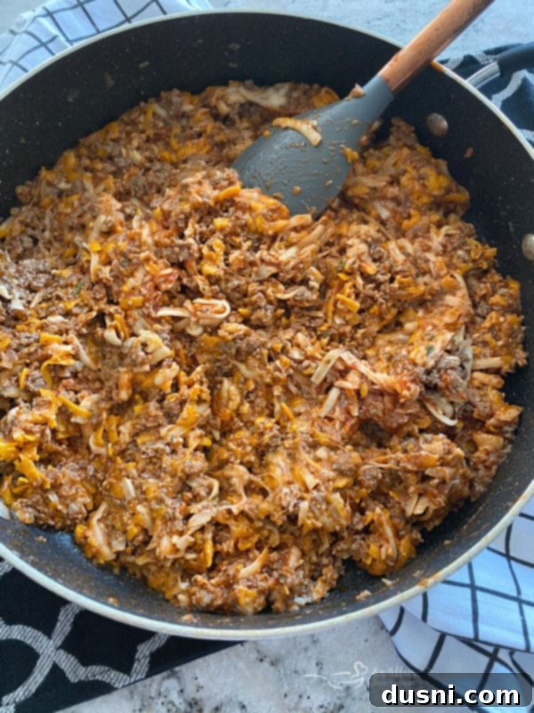 Pizza Burger Melts 5 Mixing ground beef with pizza sauce and cheeses for Open-Faced Pizza Burgers