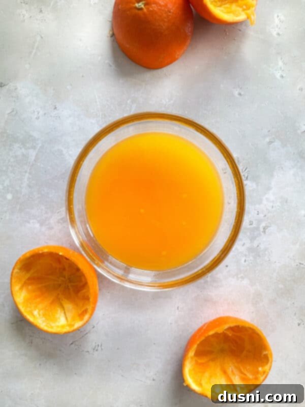 Crispy Tender Slow Cooker Carnitas 11 Pork roast with onions, garlic, and jalapeno in slow cooker