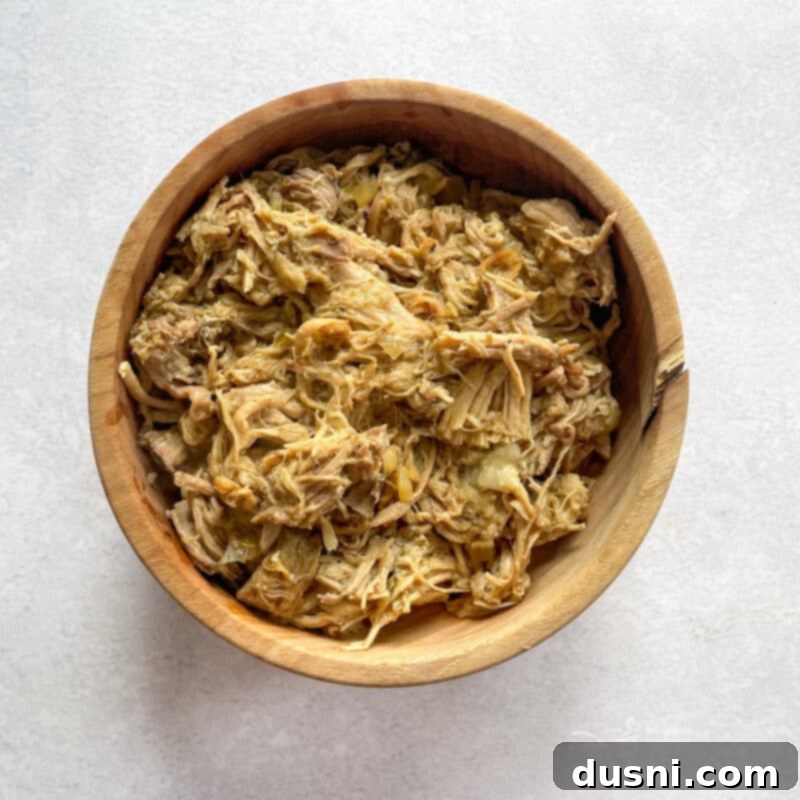 Crispy Tender Slow Cooker Carnitas 3 Slow Cooker Carnitas with a side of limes