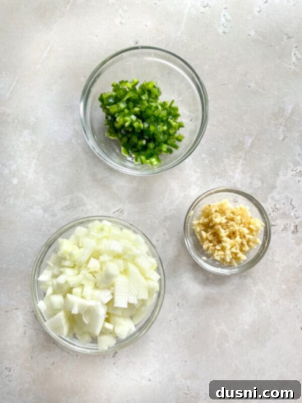 Crispy Tender Slow Cooker Carnitas 7 Ingredients for Slow Cooker Carnitas laid out