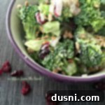 Creamy Broccoli Crunch 2 Close up of a bowl of Easy Broccoli Salad, showing texture and ingredients