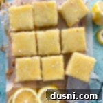 top view of lemon brownies on a cutting board, ready to be served