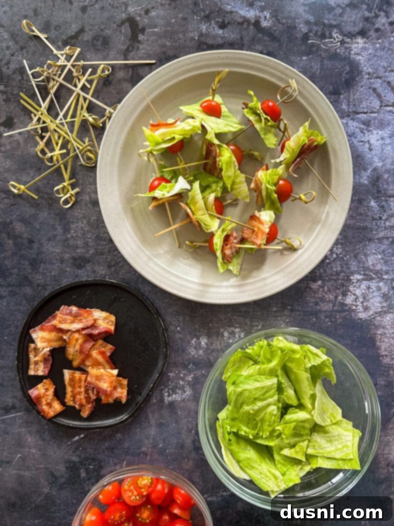 Close up of a tray of Bacon Cheeseburger Meatballs with melted cheese
