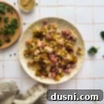 Creamy Chicken Cordon Bleu Bake 14 Chicken Cordon Bleu Casserole on a shell plate.