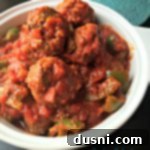 Stuffed Pepper Style Meatballs 2 "Stuffed Pepper" Meatballs in a white serving bowl