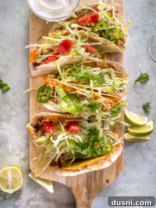 Double Decker Tacos on a wooden board ready to be served