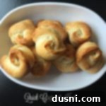 Mastering Quick Crescent Knots 2 close up of Quick Crescent Knots on a white plate