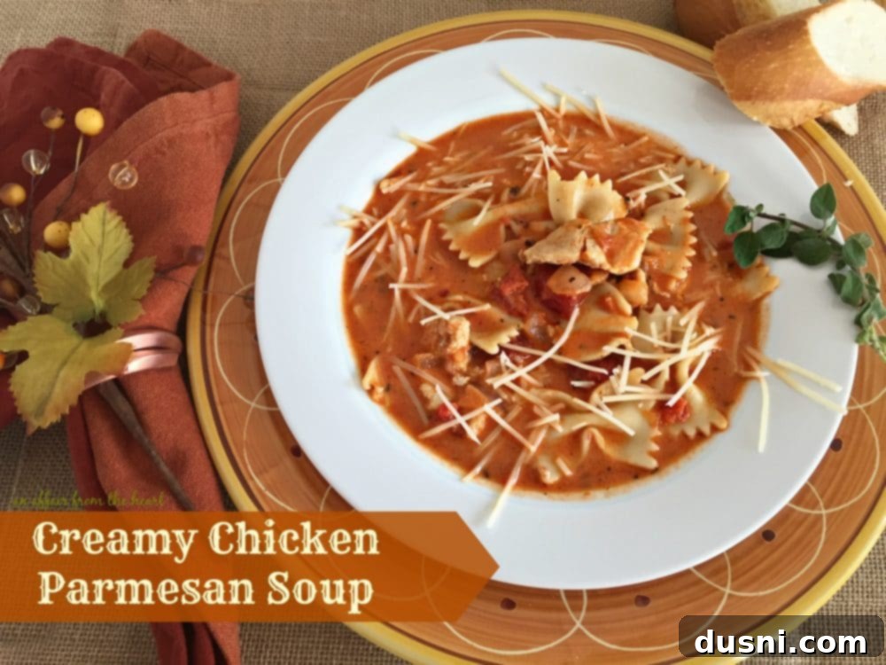 Creamy Chicken Parmesan Soup in a white bowl