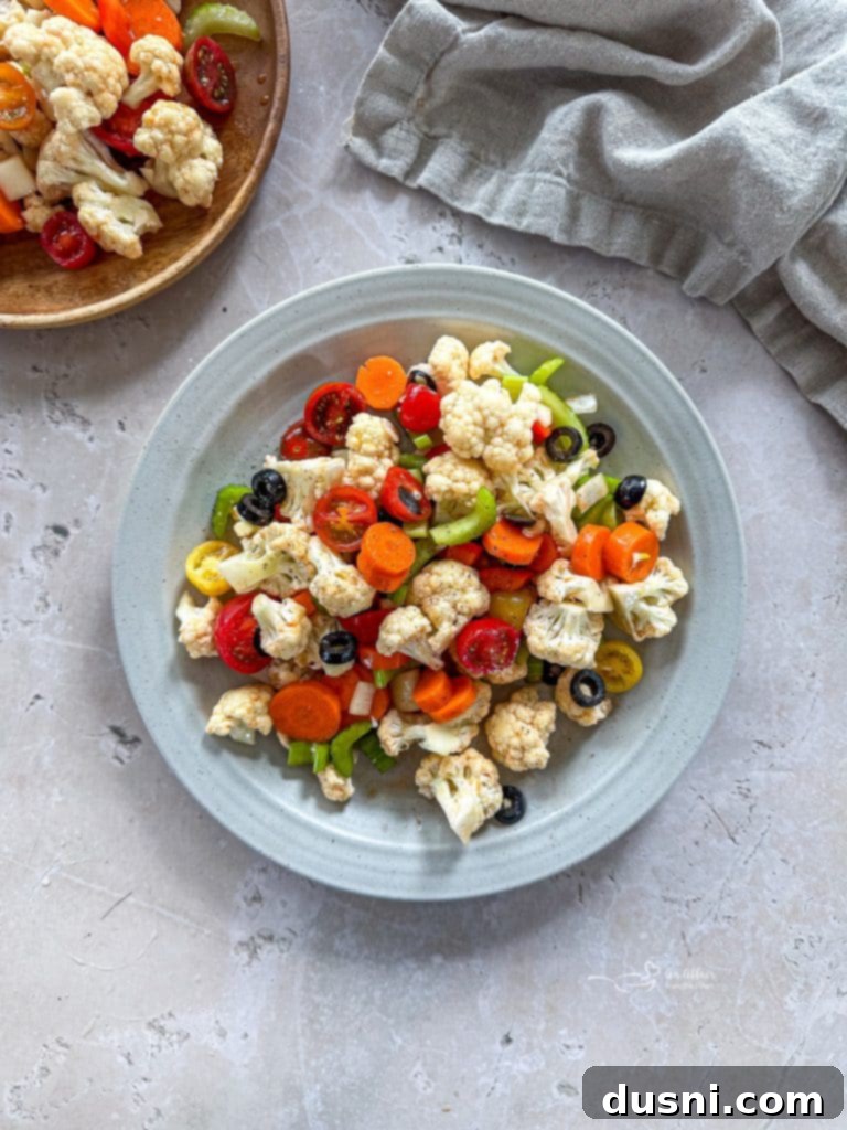 Zesty Marinated Veggies 13 A vibrant bowl of marinated vegetables served, ready to eat.