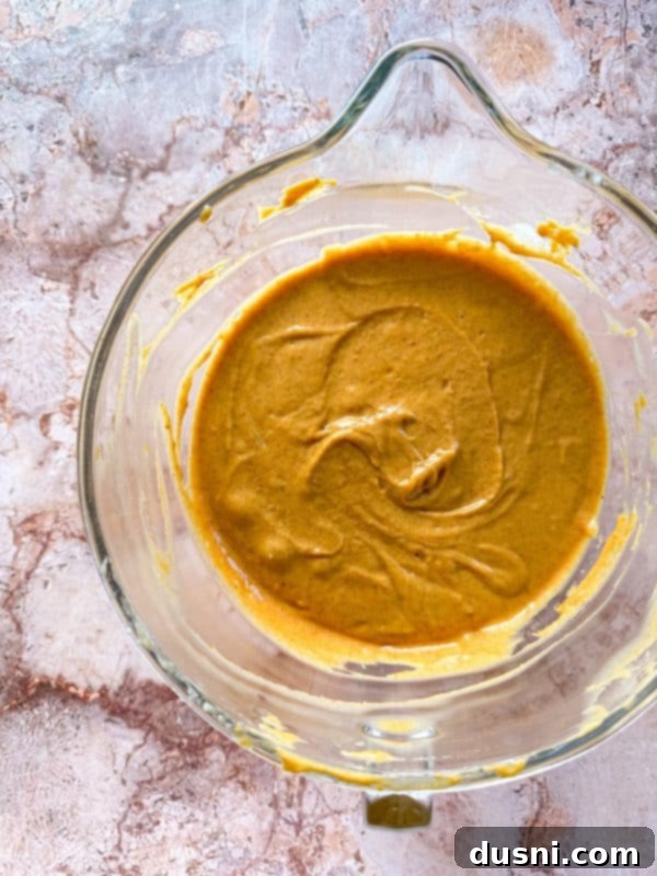 Pumpkin Bundt Cake batter in a bowl