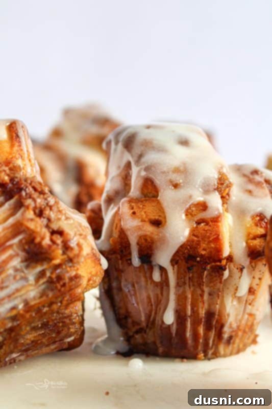 Close-up of golden-brown Toffee Monkey Bread Muffins with visible toffee bits