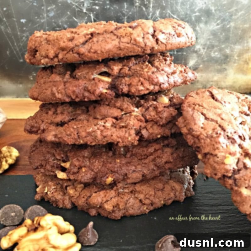Close up, side view of giant-chocolate-toffee-cookies stacked on a table