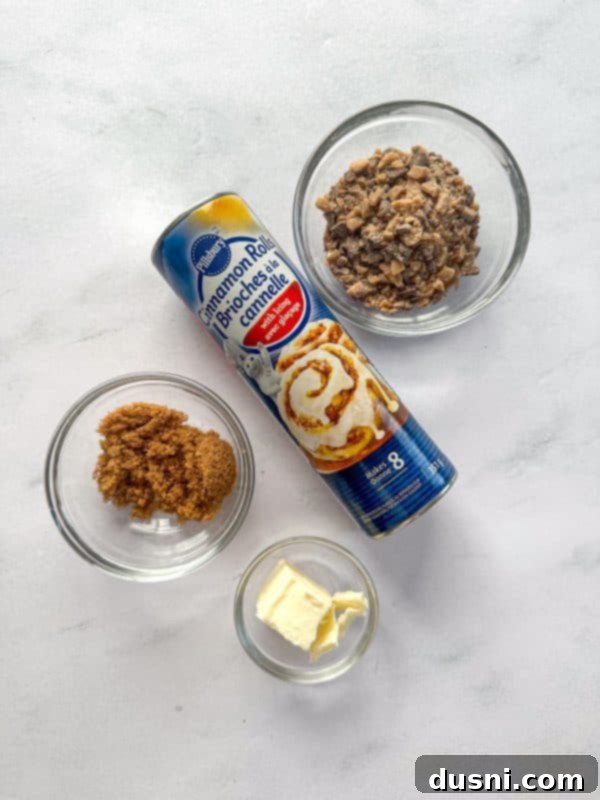 Close-up of a single Toffee Monkey Bread Muffin, revealing its sticky layers and toffee bits