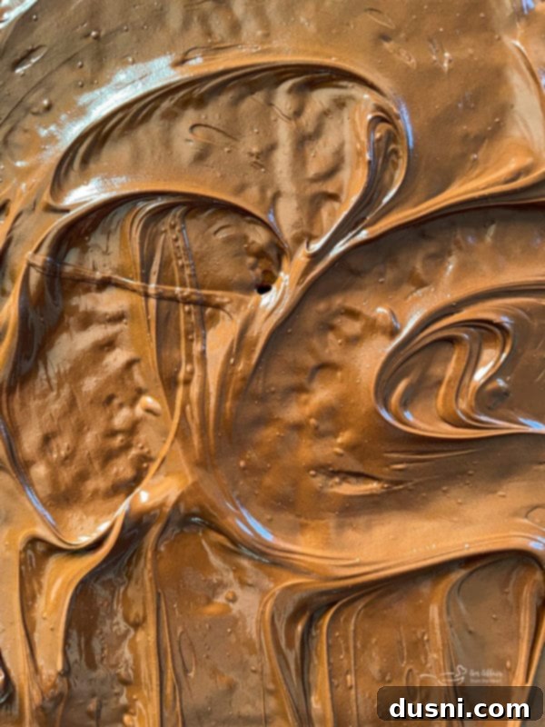 Homemade Graham Cracker Toffee 4 melted chocolate on crackers