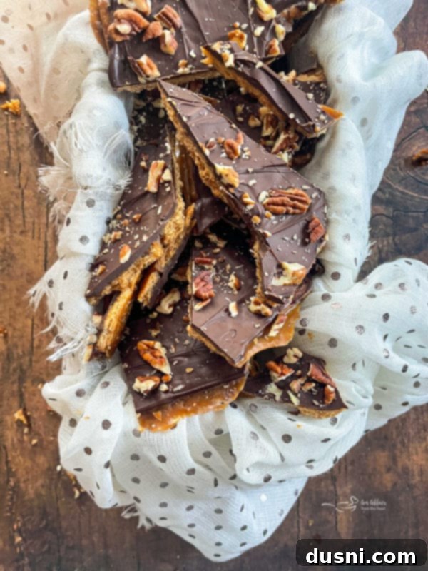 Graham Cracker Toffee Bark broken up pieces of pecan chocolate bark with pecans