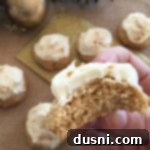 Close up of Frosted Eggnog Cookie with a bite out of it