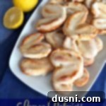 Golden Zest Palmiers 2 Lemon Palmiers on a white serving dish with text "Lemon Palmiers"