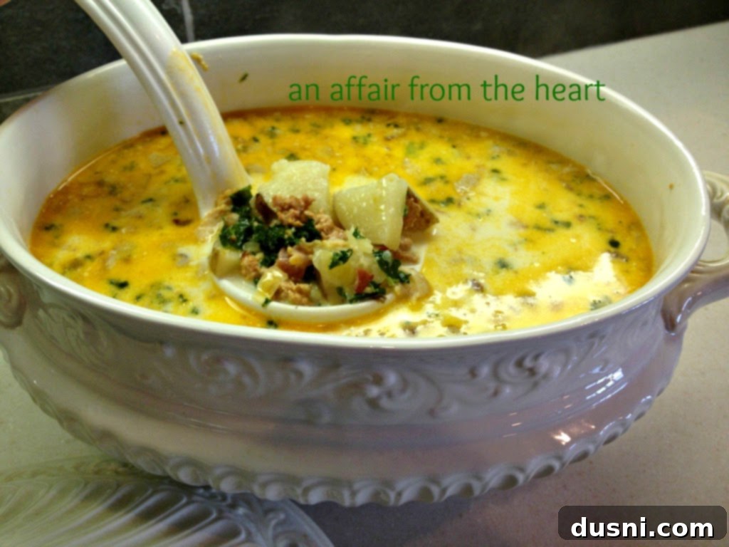Zuppa Toscana - a hearty, creamy Italian sausage, potato, and kale soup.