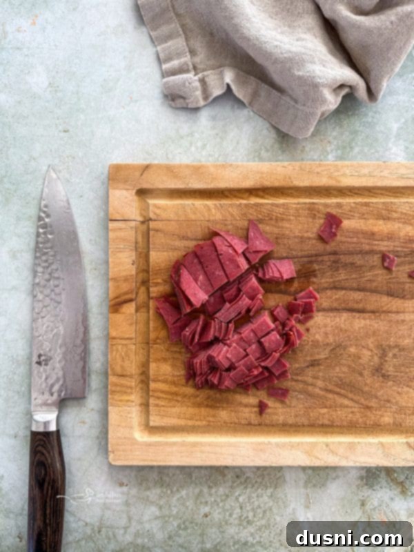 Zesty Dill Pickle Dip 11 Dill Pickle Dip garnished with fresh dill in a white decorative bowl