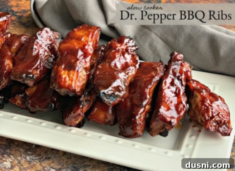 A spread of delicious Dr. Pepper BBQ Ribs on a wooden board