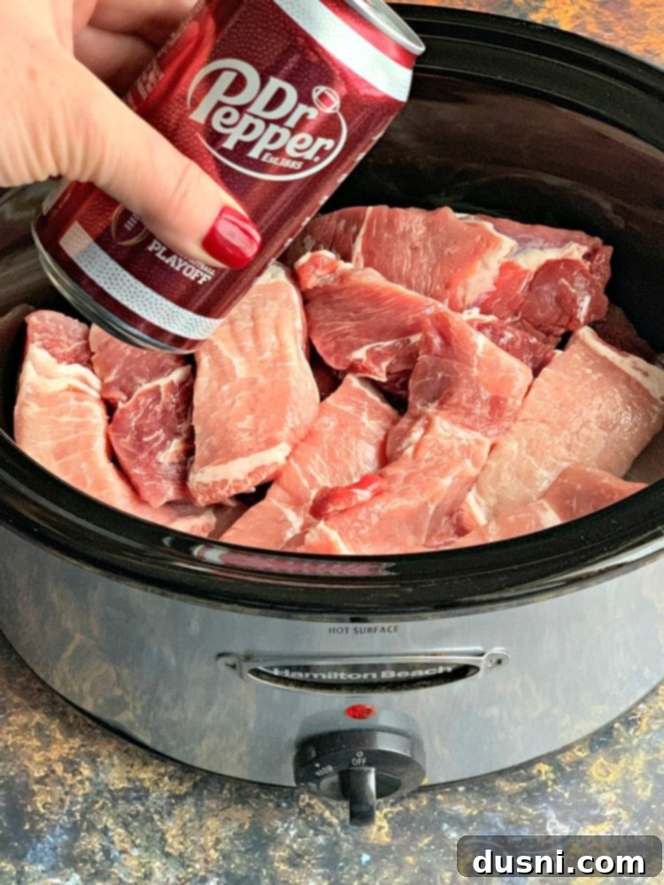 Country style pork ribs placed in the slow cooker