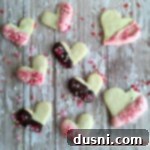 Dipped Shortbread Delights 8 Valentine Dipped Shortbread Cookies on a wood surface, top-down view