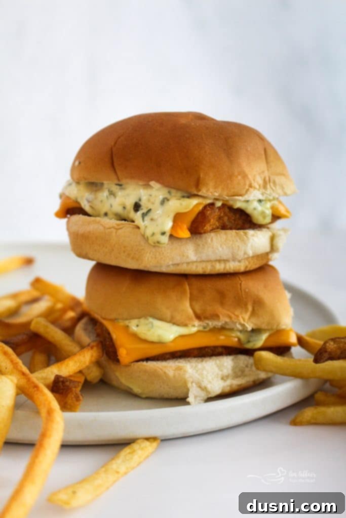 Your Favorite Filet-O-Fish & McDonald's-Inspired Tartar Sauce, Made At Home 2 Homemade Filet-O-Fish sandwich with steamed bun, crispy fish, and tartar sauce