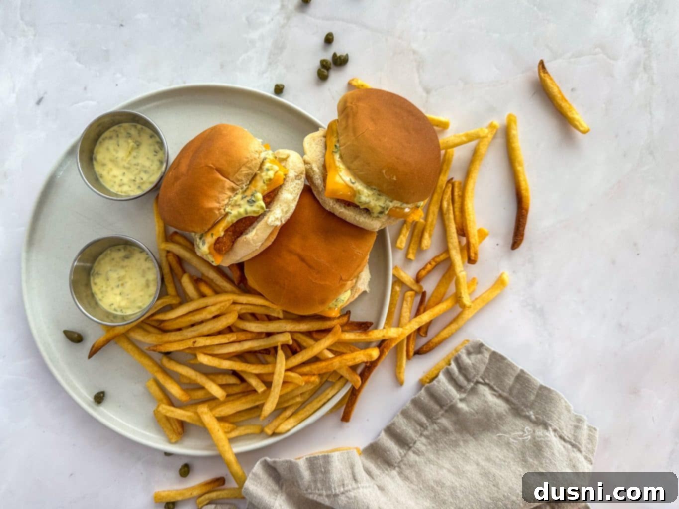 Your Favorite Filet-O-Fish & McDonald's-Inspired Tartar Sauce, Made At Home 4 Ingredients for copycat McDonald's Filet-O-Fish and tartar sauce on a counter