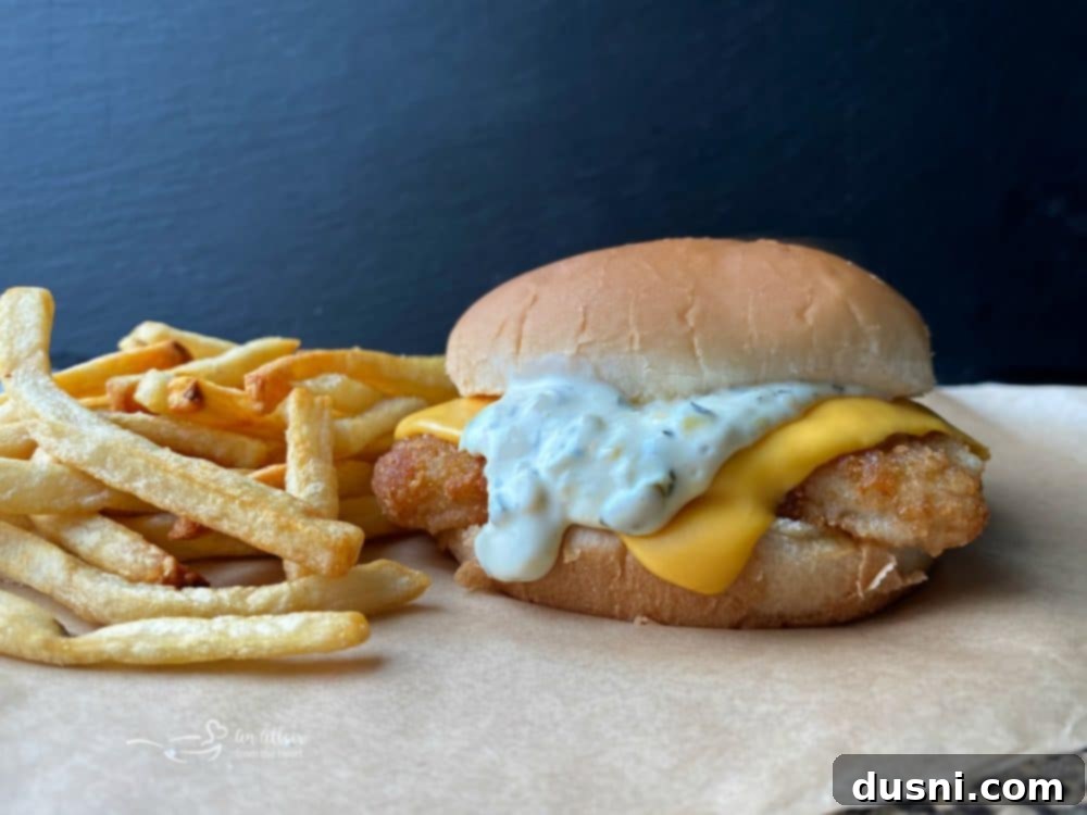 Your Favorite Filet-O-Fish & McDonald's-Inspired Tartar Sauce, Made At Home 5 Close-up of a McDonald's copycat Filet-O-Fish sandwich with golden fries