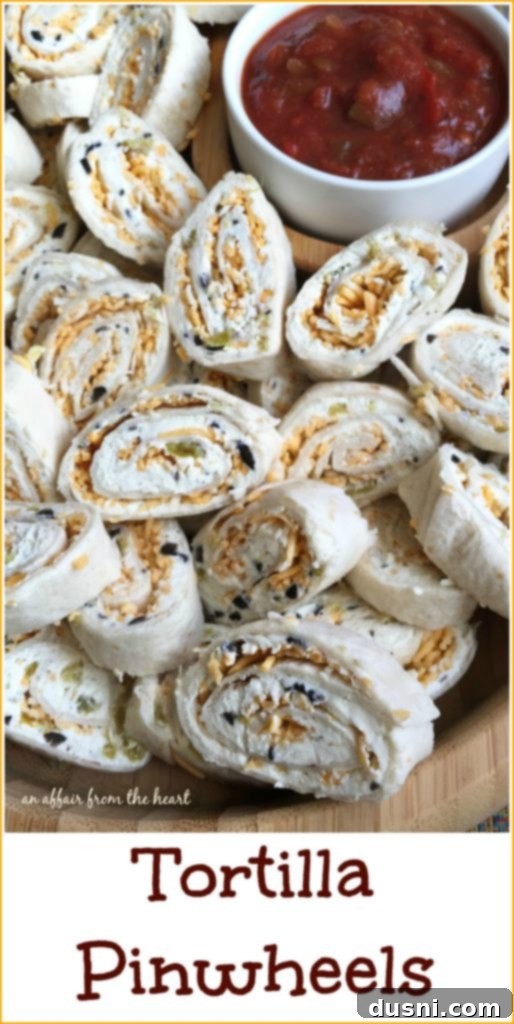 Assortment of tortilla pinwheels on a elegant serving board