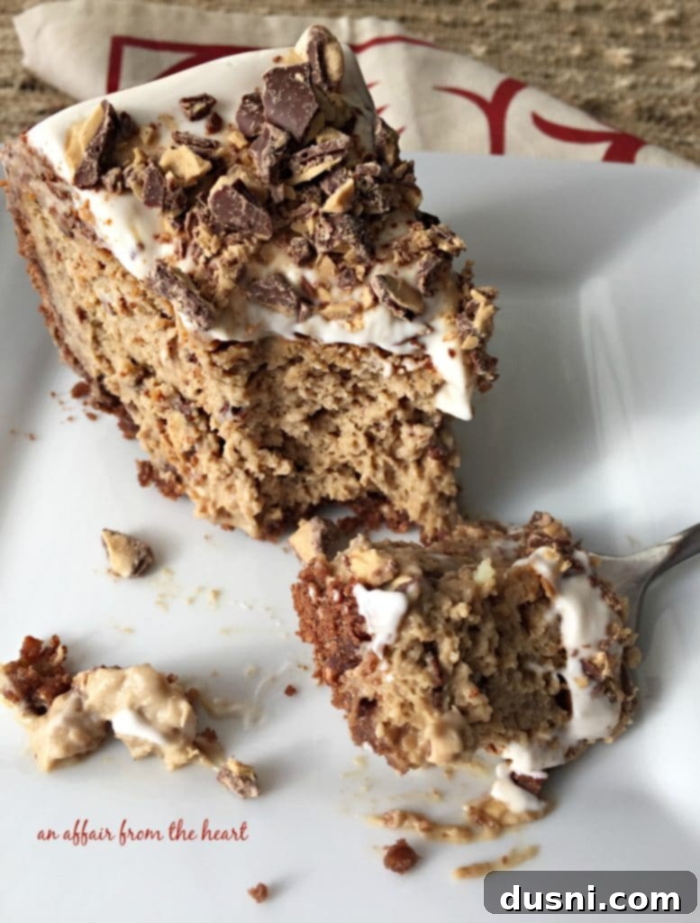 Cross-section of the Coffee Toffee Cheesecake showing the mocha crust, creamy coffee filling with toffee bits, and sweet cream topping