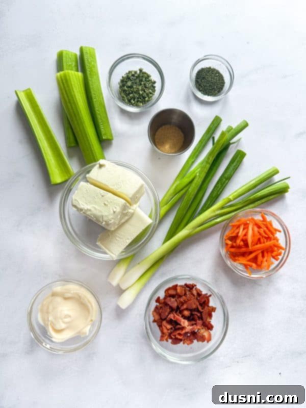 All the ingredients for the sandwich spread in a food processor.