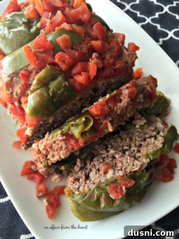 One-Pan Stuffed Peppers 14 Overhead image of Stuffed Pepper Meatloaf on a white platter