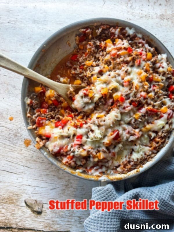 One-Pan Stuffed Peppers 16 Close-up of Stuffed Pepper Skillet with melted cheese