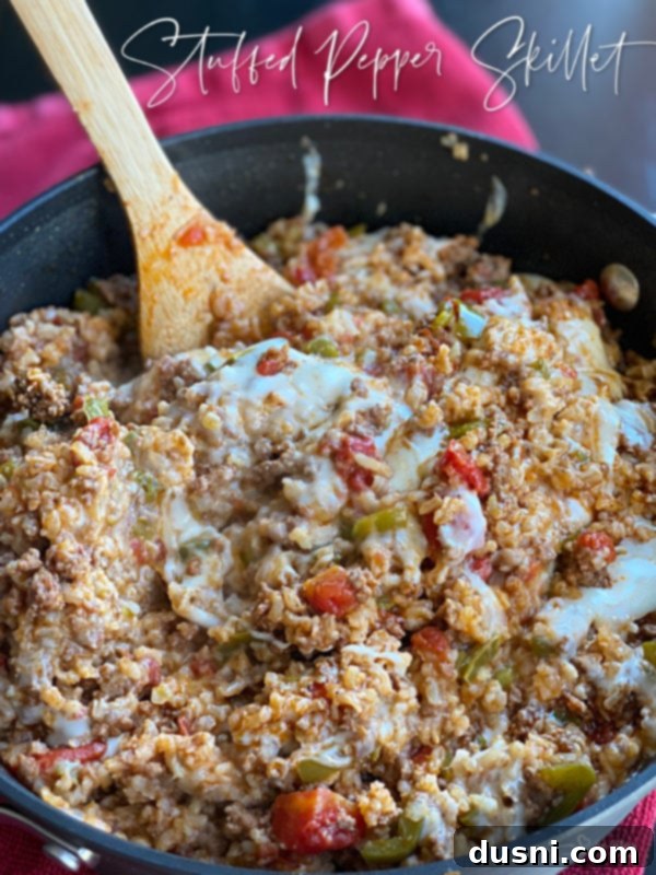 One-Pan Stuffed Peppers 19 Stuffed Pepper Skillet with a hero shot and title
