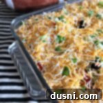 Overhead of Mexican Layered Bean Dip with text " Mexican Layered Bean Dip"