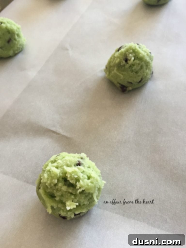 Baked Mint Chocolate Chip Cookies cooling on a wire rack
