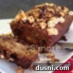 S'more banana bread on a white platter with text 