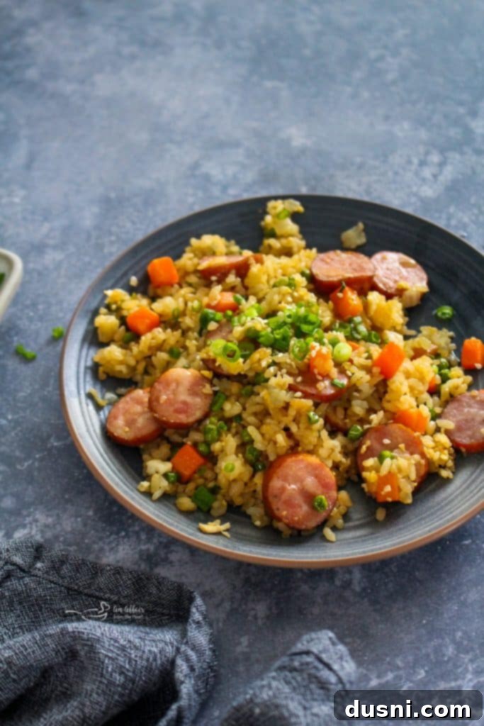 Hearty Kielbasa Fried Rice 12 A Pinterest-friendly image for Kielbasa Fried Rice, featuring the dish and recipe title
