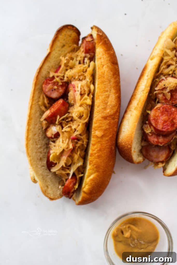 Hearty Kielbasa Fried Rice 13 Sauerkraut and Kielbasa Hoagies close up on a white counter, featuring a savory meal
