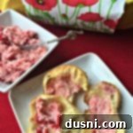 Classic Popovers with Velvety Cherry Butter 10 Old Fashioned Pop Overs with Cherry Butter spread on it