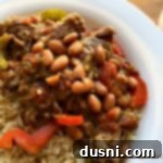 Spicy Crock Pot Steak and Beans 6 Close up of Crock Pot Spicy Steak & Beans in a white bowl