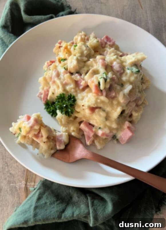 A delicious Chicken Cordon Bleu Casserole with Rice, served in a baking dish